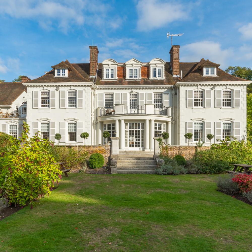 Gorse Hill Gift Vouchers featuring rear shot of mansion house building